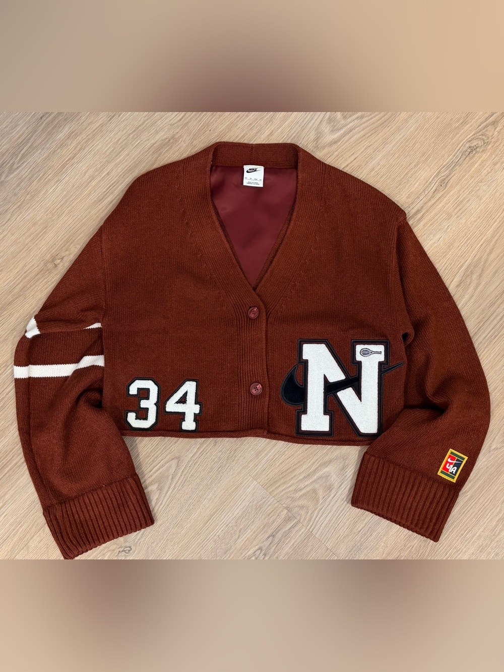 Nike Women's Rust Brown Cropped Varsity Cardigan with White Number & Patch